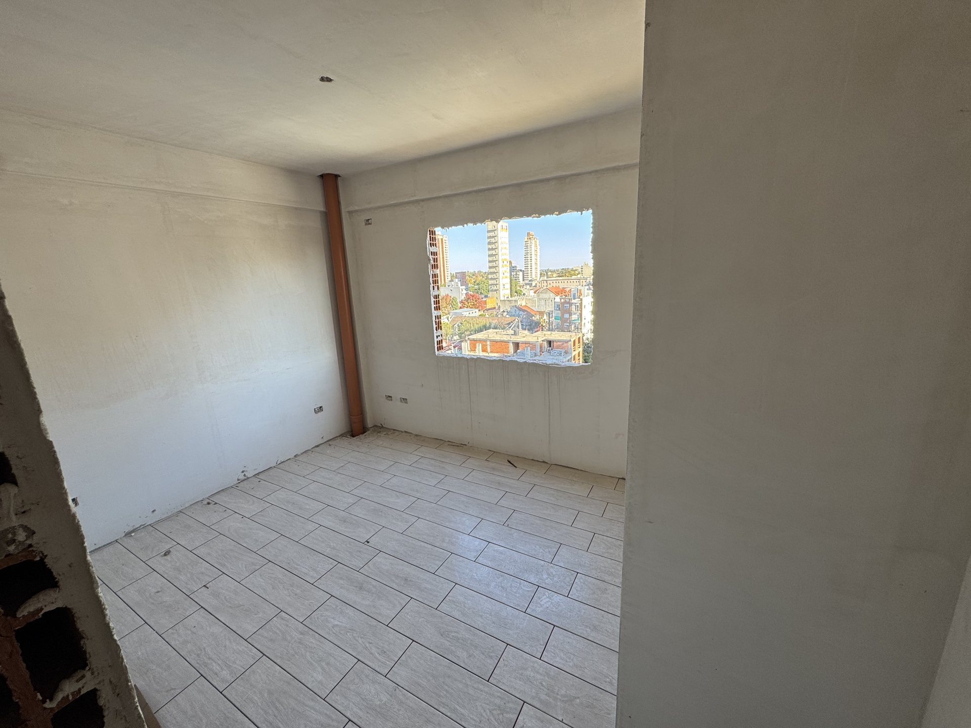 Interior de una unidad de Edificio Tsidkenu